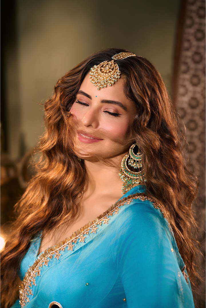 Amna Sharif in Solid Turquoise Lehenga with Blouse and Embroidered Dupatta (set of 3)