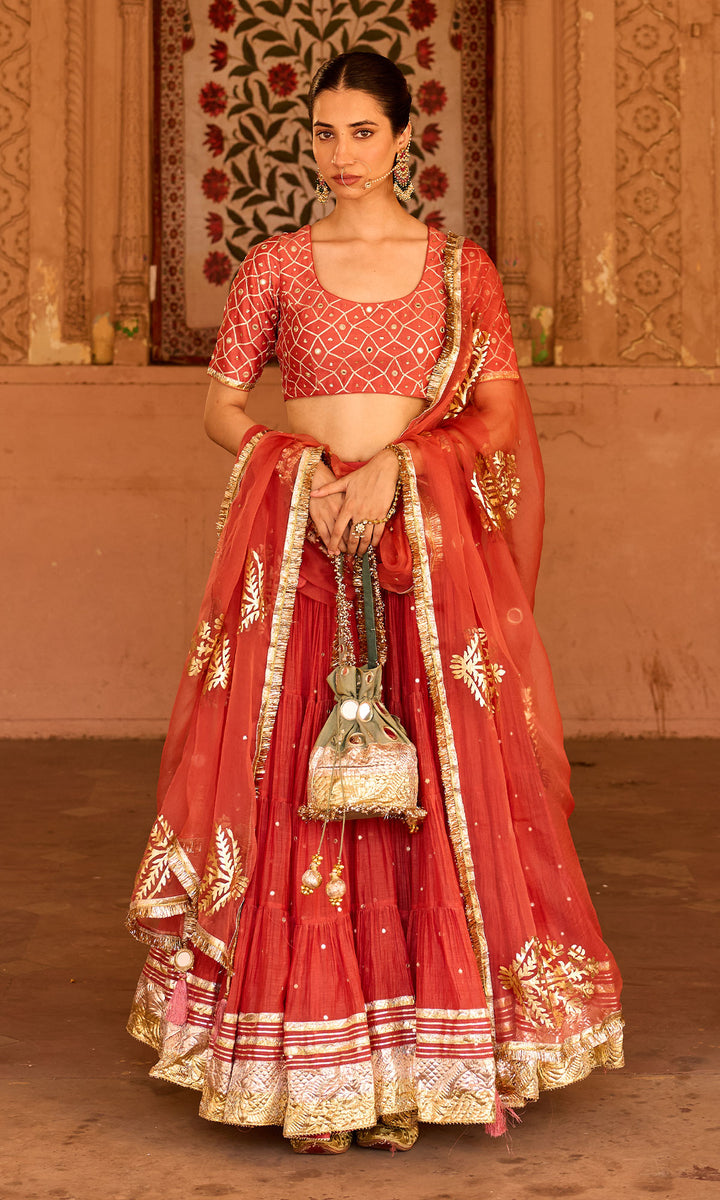 Phillauri 2 rust teared lehenga with gota work blouse and foil  print dupatta (set of 3)