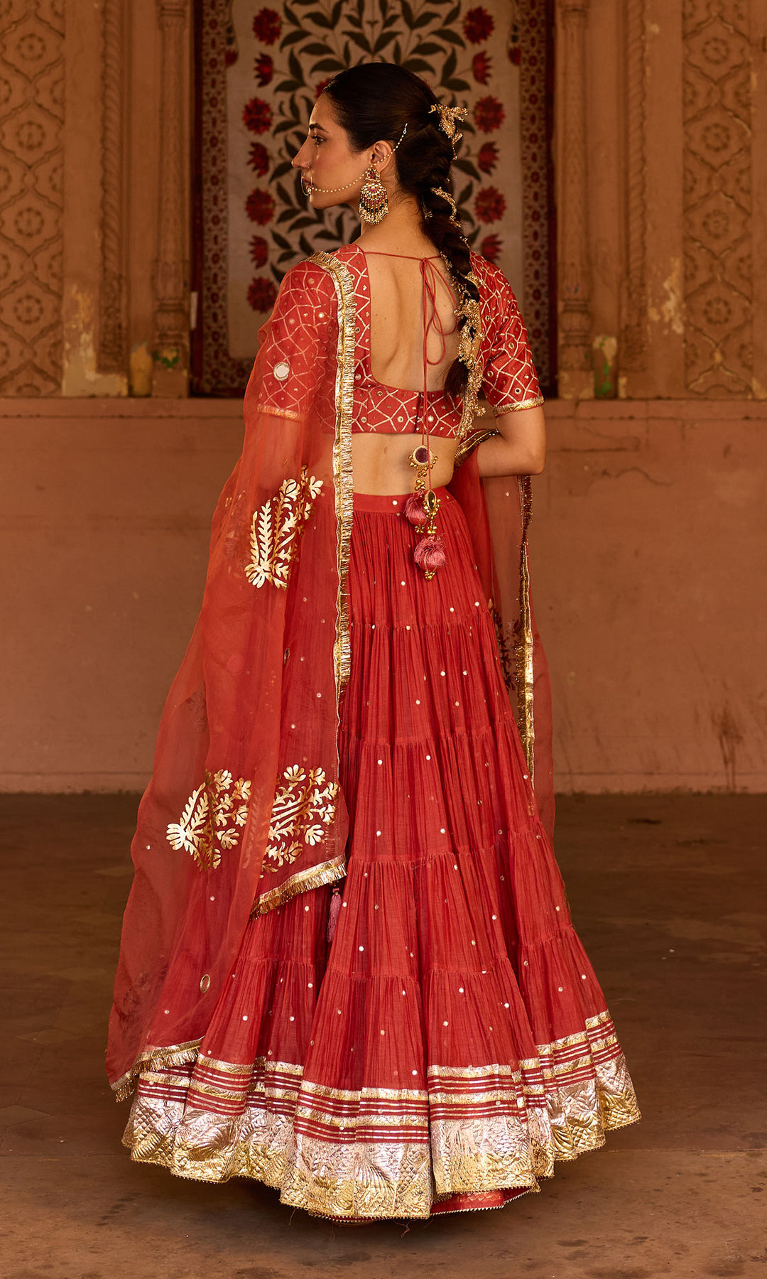 Phillauri 2 rust teared lehenga with gota work blouse and foil  print dupatta (set of 3)