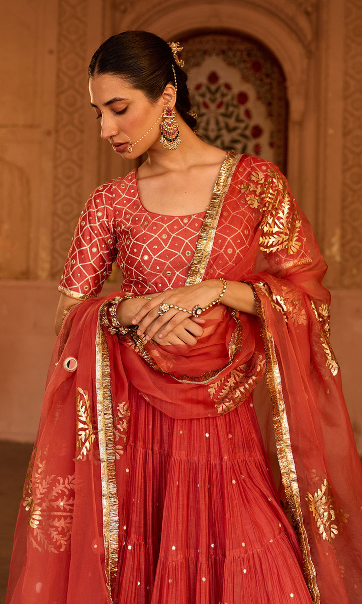 Phillauri 2 rust teared lehenga with gota work blouse and foil  print dupatta (set of 3)