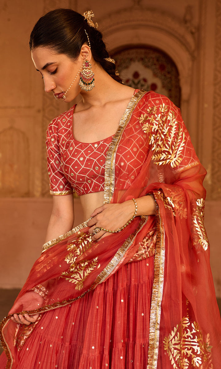 Phillauri 2 rust teared lehenga with gota work blouse and foil  print dupatta (set of 3)