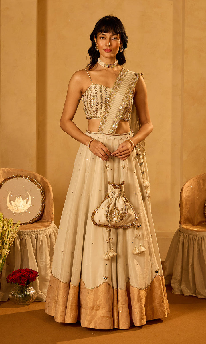 Dilbaro Tissue Gold and Ivory Drape Lehenga Saree with Embroidered Strap Blouse (set of 2)