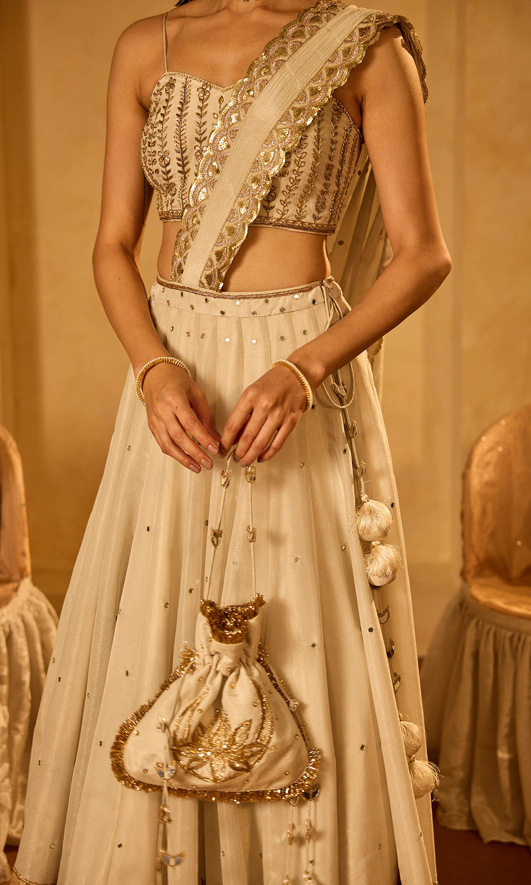 Dilbaro Tissue Gold and Ivory Drape Lehenga Saree with Embroidered Strap Blouse (set of 2)