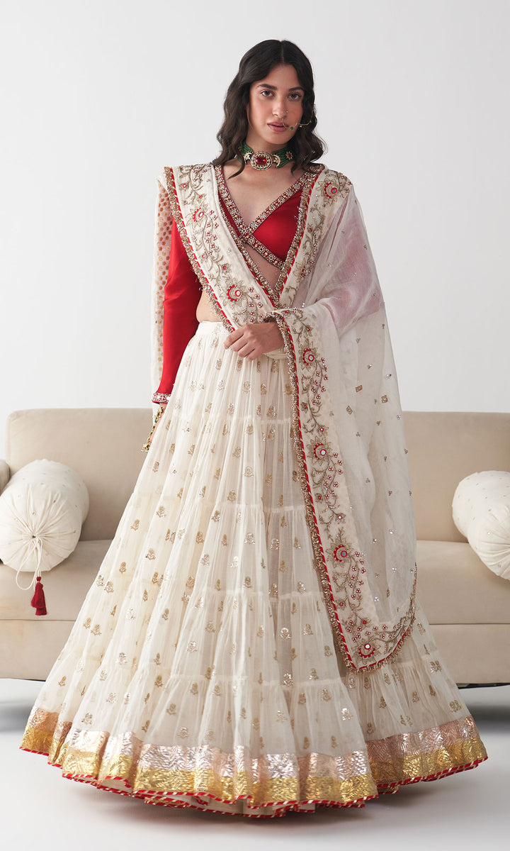 Ishq Off White Tiered Lehenga with Embroidered Red Blouse and Dupatta( Set of 3)