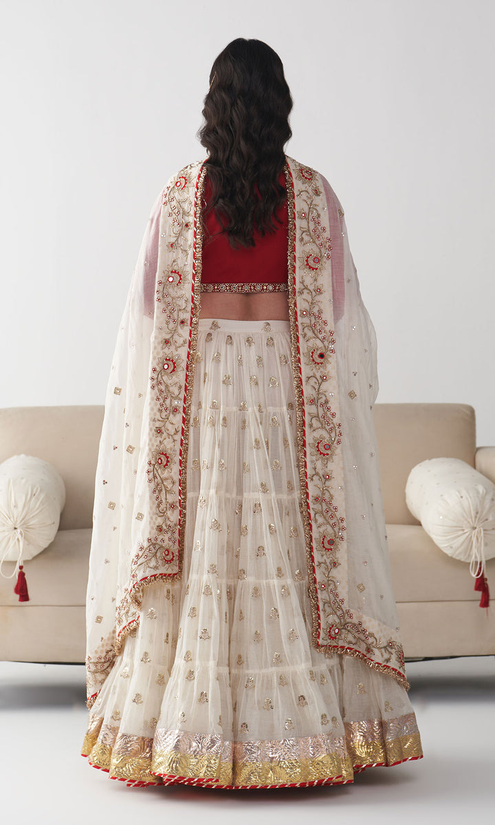 Ishq Off White Tiered Lehenga with Embroidered Red Blouse and Dupatta( Set of 3)