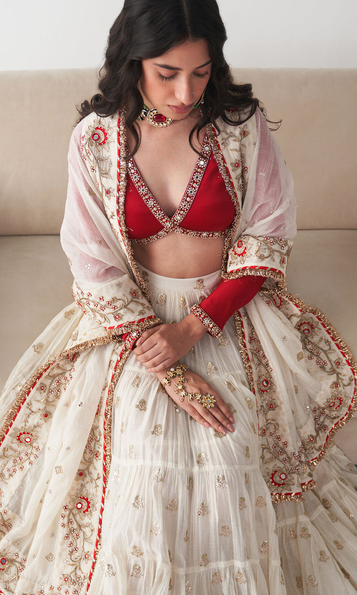 Ishq Off White Tiered Lehenga with Embroidered Red Blouse and Dupatta( Set of 3)