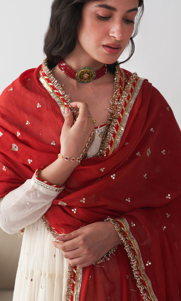 Ishq Off white Tiered anarkali with chooridar and red dupatta ( set of 3)