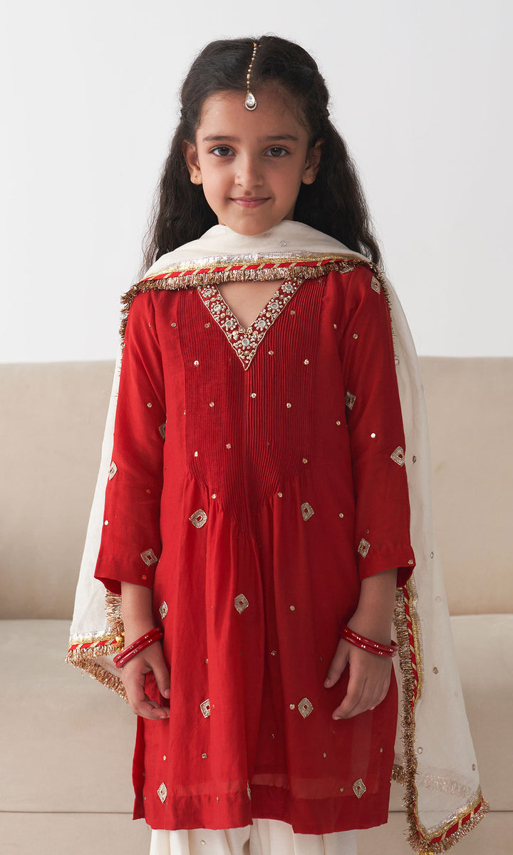Ishq Red pintuck kurta with off white salwar and dupatta (set of 3)