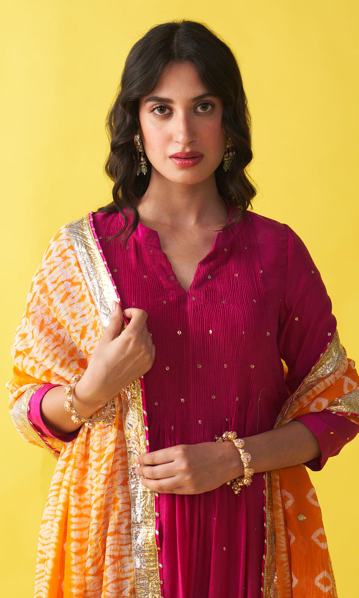 Gulzaar rani pink Solid mukaish pintuck kurta with salwar and dupatta (set of 3)