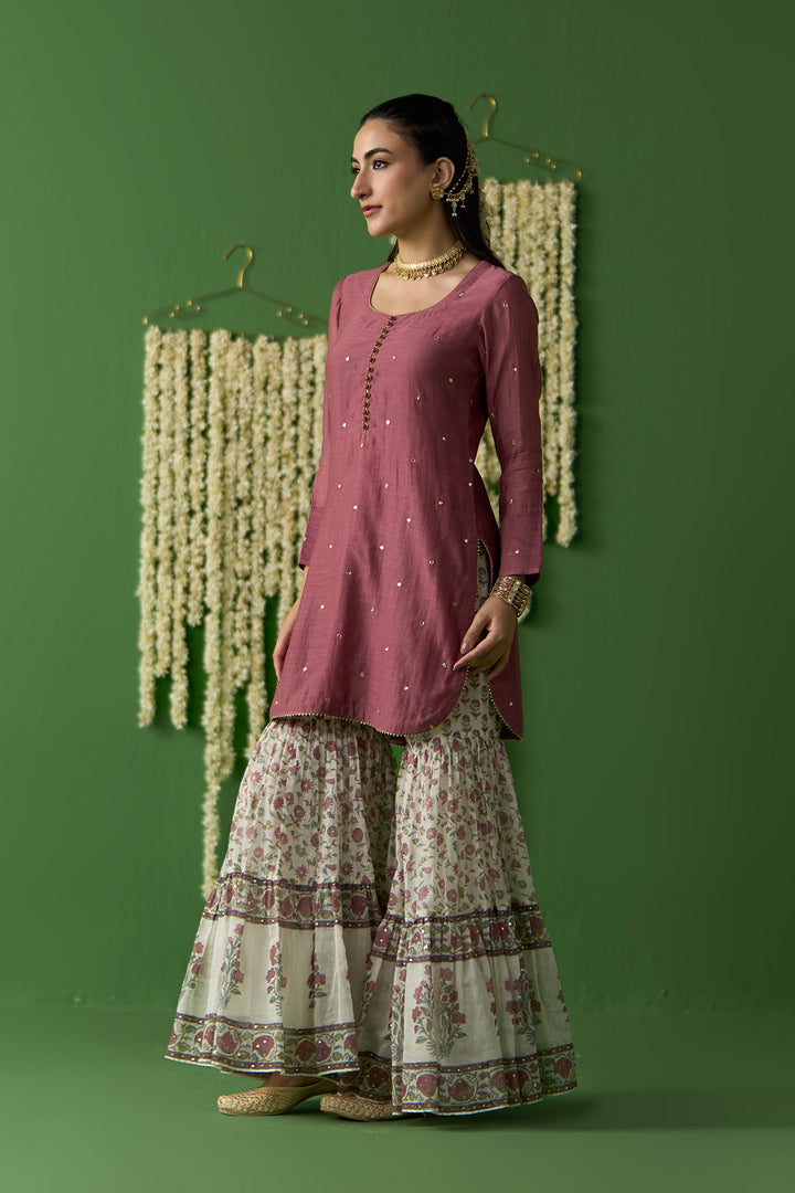 Gulnaar Ivory With Onion Pink Solid short kurta with block printed gharara and gota work dupatta ( set of 3)