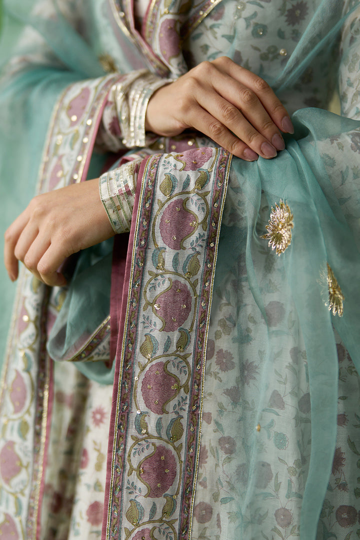 Gulnaar Ivory With Turquoise Block printed long anarkali with churidar and dupatta ( set of 3)