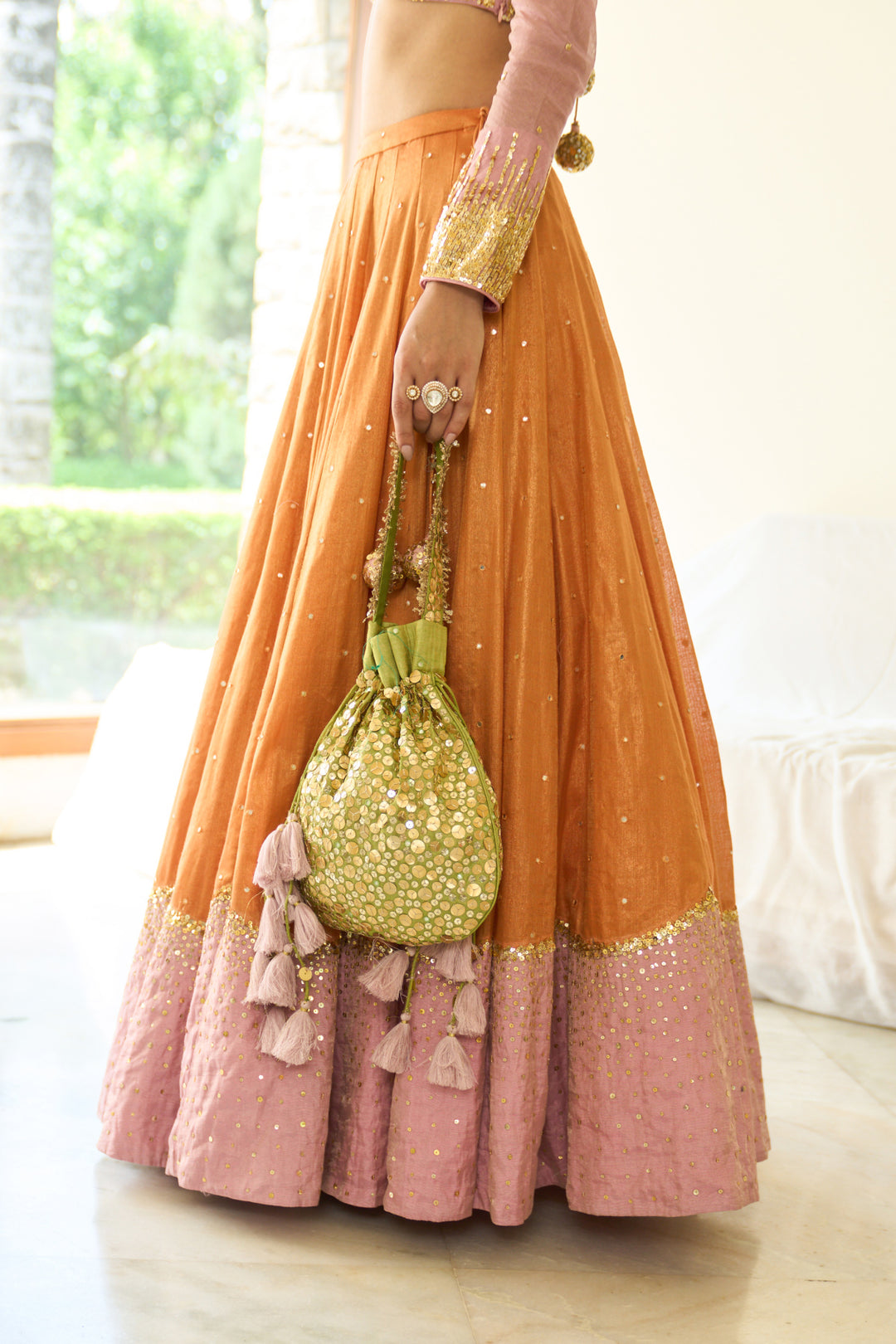 Saanjh sequins mint green potli bag