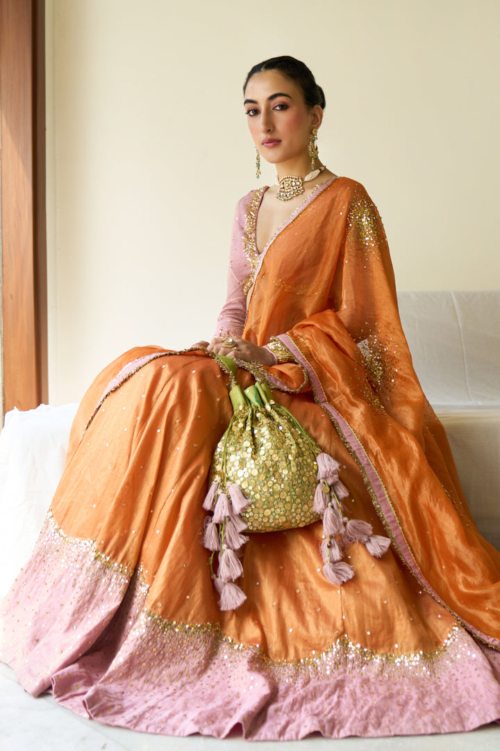Saanjh sequins mint green potli bag