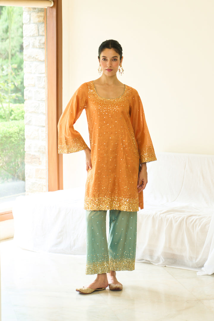 Saanjh sequins orange short straight kurta with palazzo and dupatta ( set of 3)