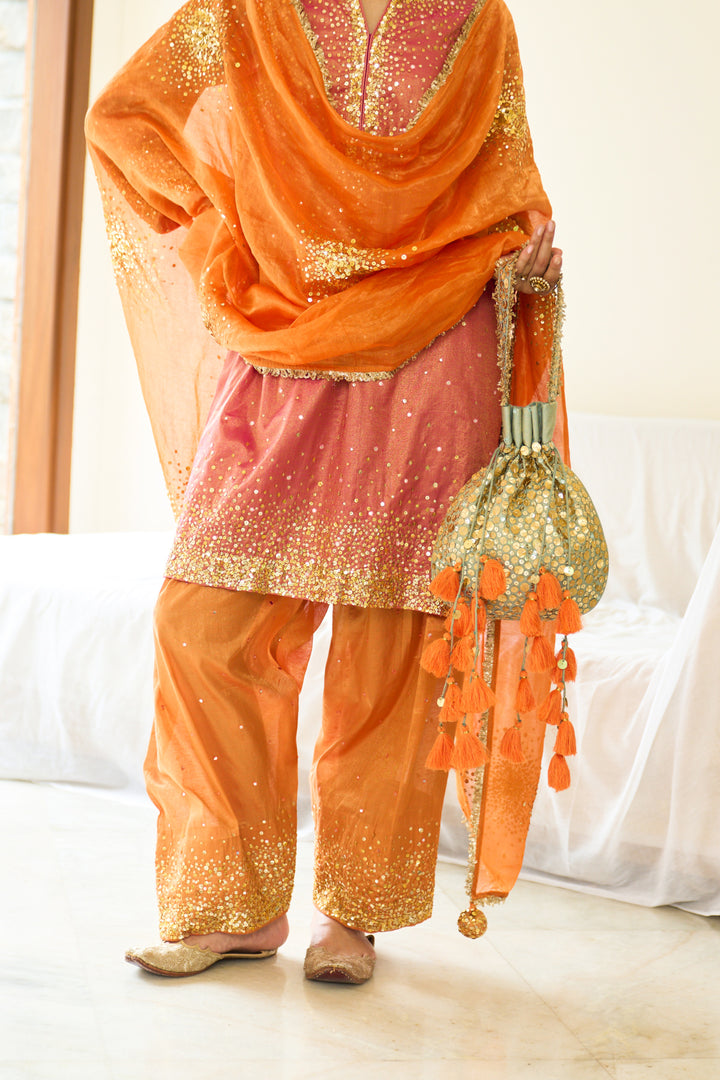 Saanjh sequins neon green potli bag