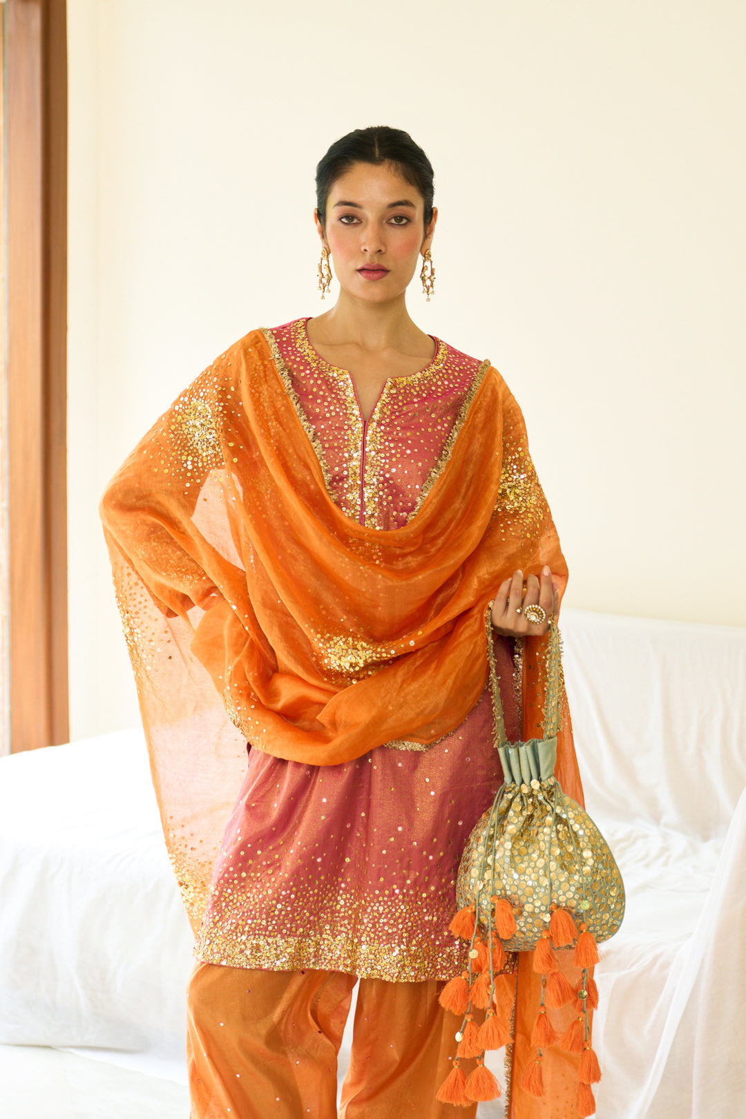 Saanjh sequins neon green potli bag