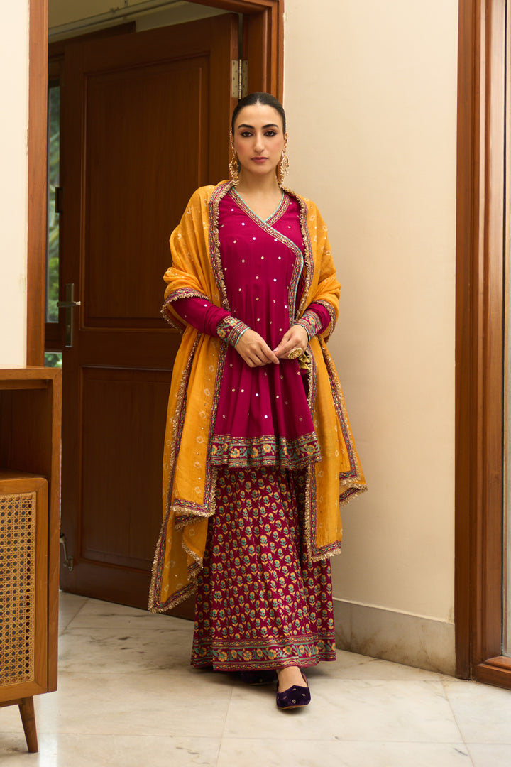Saanjh block printed rani pink angrakha with sharara and bandhej dupatta( set of 3)