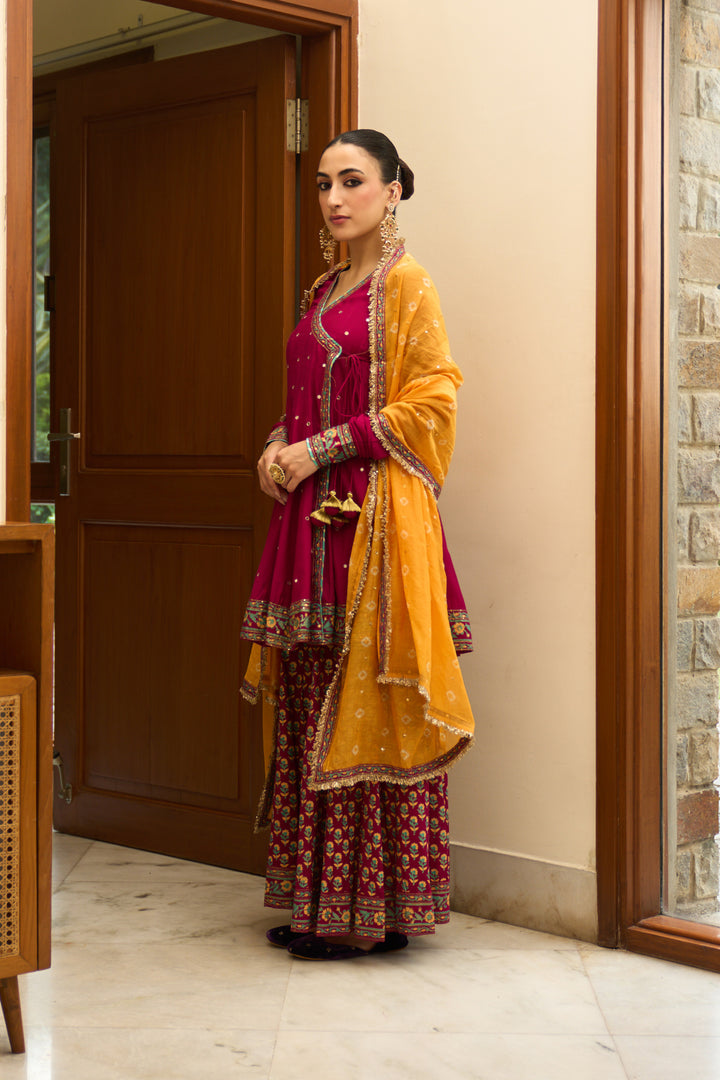 Saanjh block printed rani pink angrakha with sharara and bandhej dupatta( set of 3)