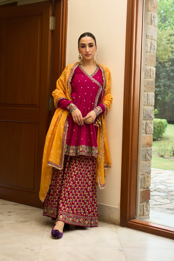 Saanjh block printed rani pink angrakha with sharara and bandhej dupatta( set of 3)