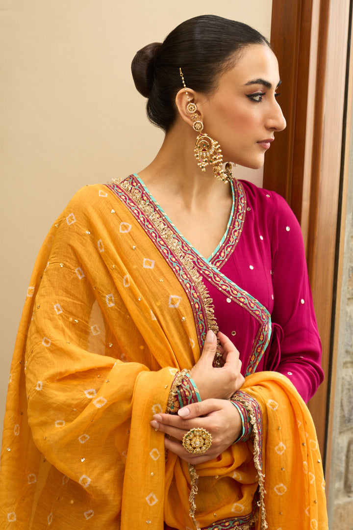 Saanjh block printed rani pink angrakha with sharara and bandhej dupatta( set of 3)
