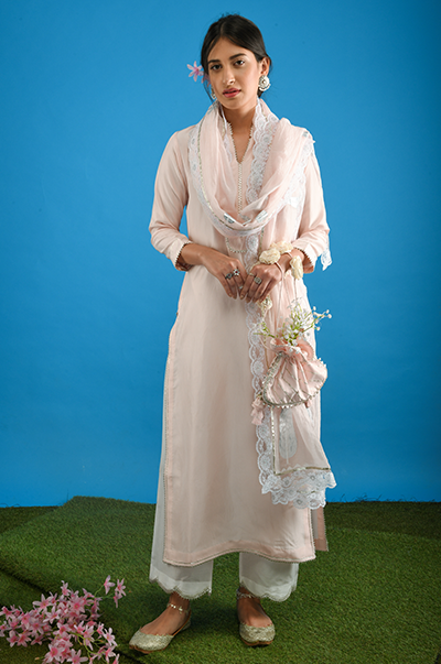 Ridhi Suri Resham Soft Pink potli with gota and organza flowers