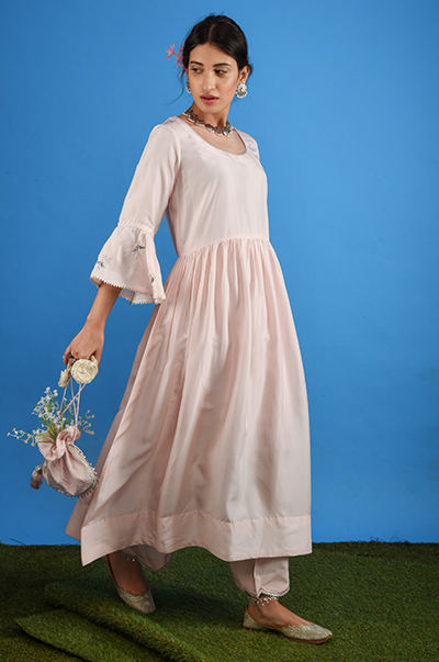 Ridhi Suri Resham Soft Pink potli with gota and organza flowers